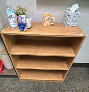Light brown wood shelving