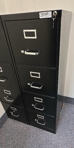 Black filing cabinet with lock and keys