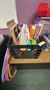 Black crate of flashcards, activity, books, giant playing cards, plus more