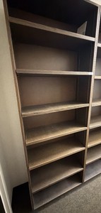 Wood and metal shelving unit with adjustable shelves