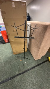 Container of foldable and portable sheet music holders