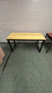 Metal and wood table, black legs, and light brown top