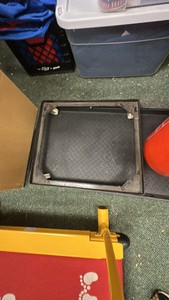 Plastic boot holder, buckets, square dolly on wheels, misc items