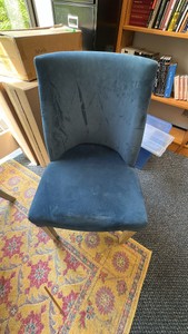 Blue suede chair with gray wood legs