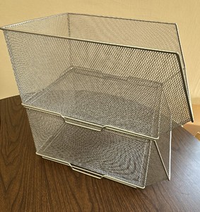 Gray mesh organizer bins