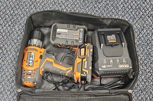 Ridgid drill with battery extra battery and charger