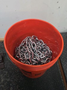 Bucket of weight lifting chains