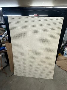 4 SHEETS OF PEGBOARD (one has two small rectangular holes cut in, see photos)