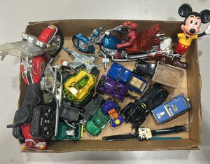 lot of miscellaneous motorcycles, cars, Batman, diecast, Mickey Mouse and more