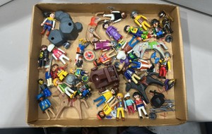 lot of Playmobil, figures, animals, vehicles, weapons, and accessories