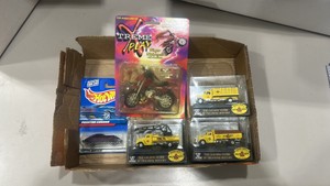lot of diecast 187HO scale Pennzoil trucks and motorcycle and diecast car