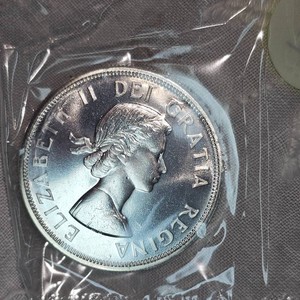 1964 Royal Canadian Mint Silver $1, 1864-1964 Proof UNC