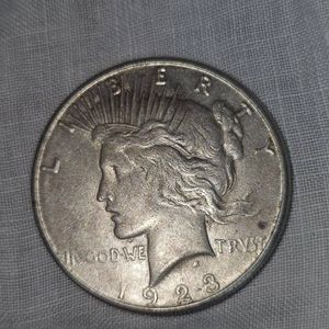 1923S Peace Dollar $1, VG wtoning