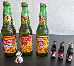 Three Sundrop Bottles, Marble on a Stand, Three Lighters