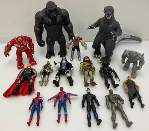 Miscellaneous collectible action figures, including godzilla and more.