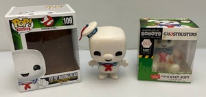 Two collectible ghostbusters Stay Puft marshmallow man. collectibles, including funko pop and handmade by robots, limited edition both items. New in box.