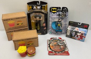 Misc. collectible action figures and more, including batman and wrestling figure and more. All new in box.