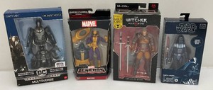 Miscellaneous vintage action figures new in box, including batman metal series, marvel, legends and more.
