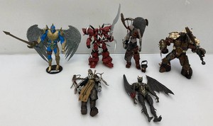 Miscellaneous pre-owned spawn action figures seem complete