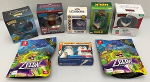 Miscellaneous miniature action figures, including Disneys stitch and Zelda. Echoes of wisdom period all new in box