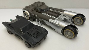 Two vintage collectible  batmobiles pre-owned.