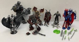 Miscellaneous pre-owned spawn action figures.  seem complete