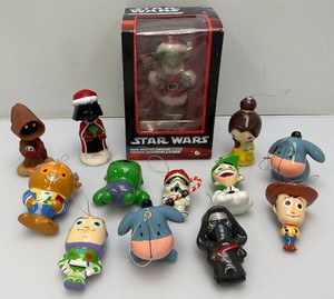 Miscellaneous vintage collectible Disney ornaments including Star Wars and moreStar wars yoda new in box.