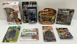 Vintage miniature action figures including g I joe, call of duty and more. all new in pack.