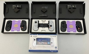 Three backbone controllers, including PlayStation. All are open box items