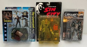 Miscellaneous vintage mcfarlane toys action figures, including spawn, sin city has yellowed bubble andMore. all new old stock