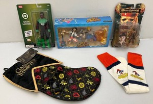 Miscellaneous vintage collectible action figures and more, including pirates of the Caribbean, green lantern and more, all are new on card or with tag.
