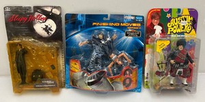 Miscellaneous vintage action figures including Austin powers, finishing moves series 4 wrestling figures and Sleepy Hollow. All old new stock on card.