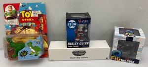 Miscellaneous vintage action figure collectibles including toy story, the hulk and more, all new old stock on card
