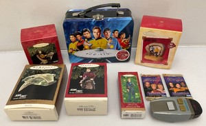 Miscellaneous star trek collectibles, including hallmark, keepsake ornaments, lunchbox and more all items seem to be new in pack.