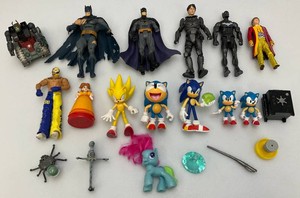 Miscellaneous vintage action figures loose, including batman and sonic hedgehog and more.