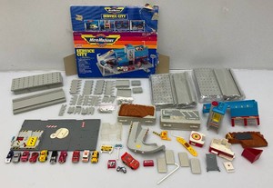 Miscellaneous collectible micro machines, including service city gas station and more. All pre-owned.