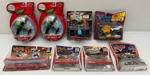 Miscellaneous Disney cars miniature die cast collectibles all new on card.