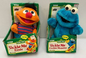 Vintage collectible TYCO sesame street tickle me Ernie and tickle me cookie monster in original packs, new old stock.