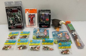 Miscellaneous vintage collectible action figures, including Star Wars and more. All new old stock.