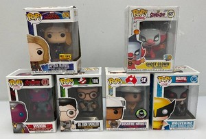 Miscellaneous collectible Funko pops, including Scooby doo, ghost clown and more. All new old stock.