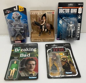 Miscellaneous action figures, including doctor who and more, most knew on card.