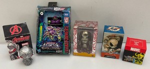 Miscellaneous vintage collectibles, including Transformers and more. All are mostly new on card.