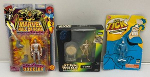 Miscellaneous vintage collectible action figures, including Star Wars and more. All new in pack.