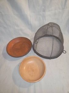 Vintage bowls and antique wire horse muzzle