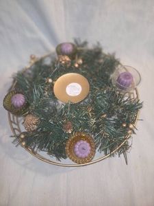 Candle centerpiece, holds five candles and greenery