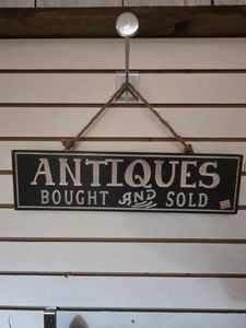 Antiques Bought and Sold sign