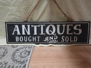 Antiques Bought and Sold sign