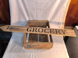 Vintage fruit crate and Wood Grocery sign
