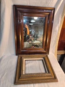 2 wooden pieces a mirror and frame