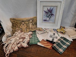 Assortment of vintage cloths and small White framed print